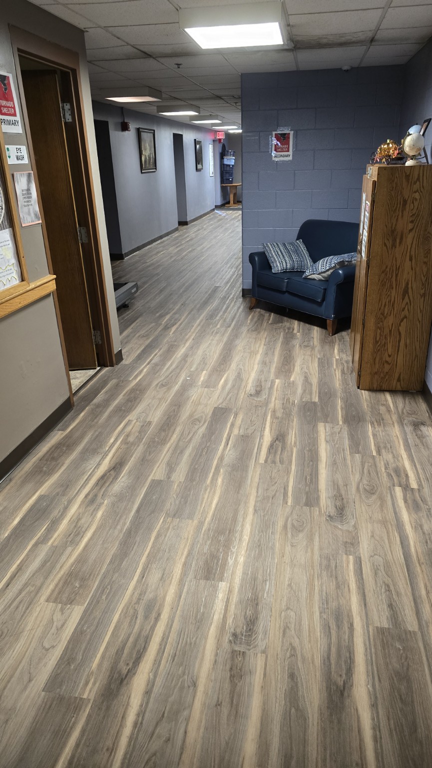 Commercial resilient flooring hallway installation