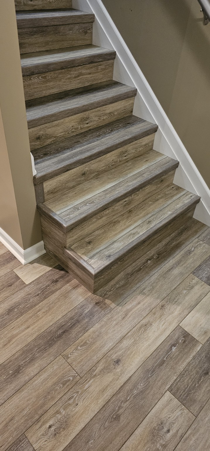 Custom stair tread and flooring detail