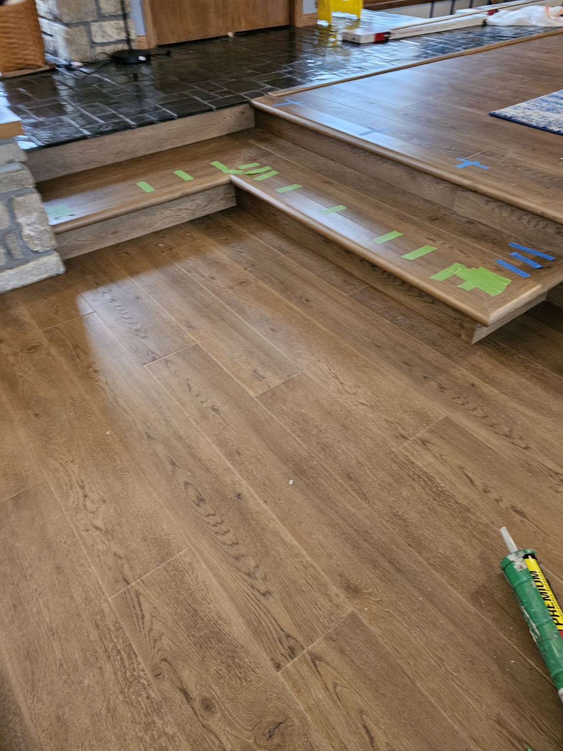 Custom multi-level stair flooring detail